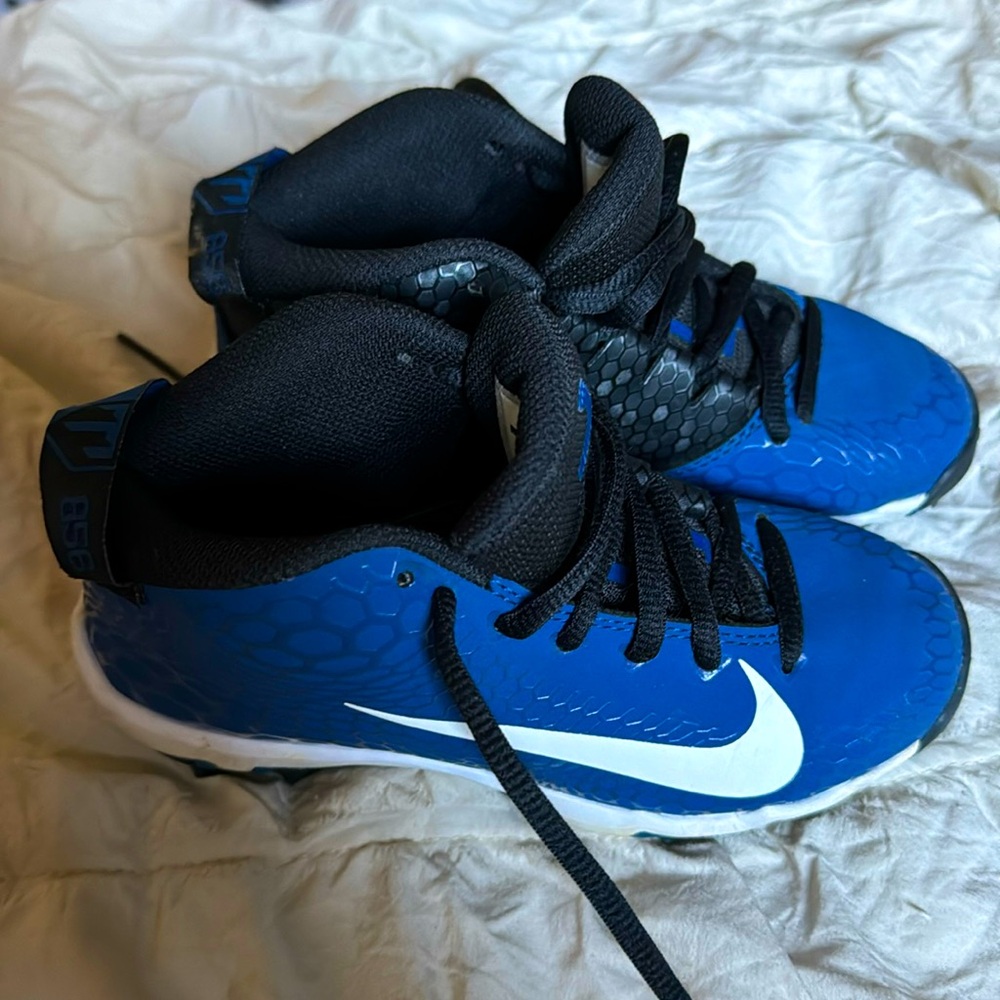 Boys blue Nike fast flex cleats